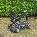Side view of TGA Minimo refurbished folding mobility scooter UK – compact travel design