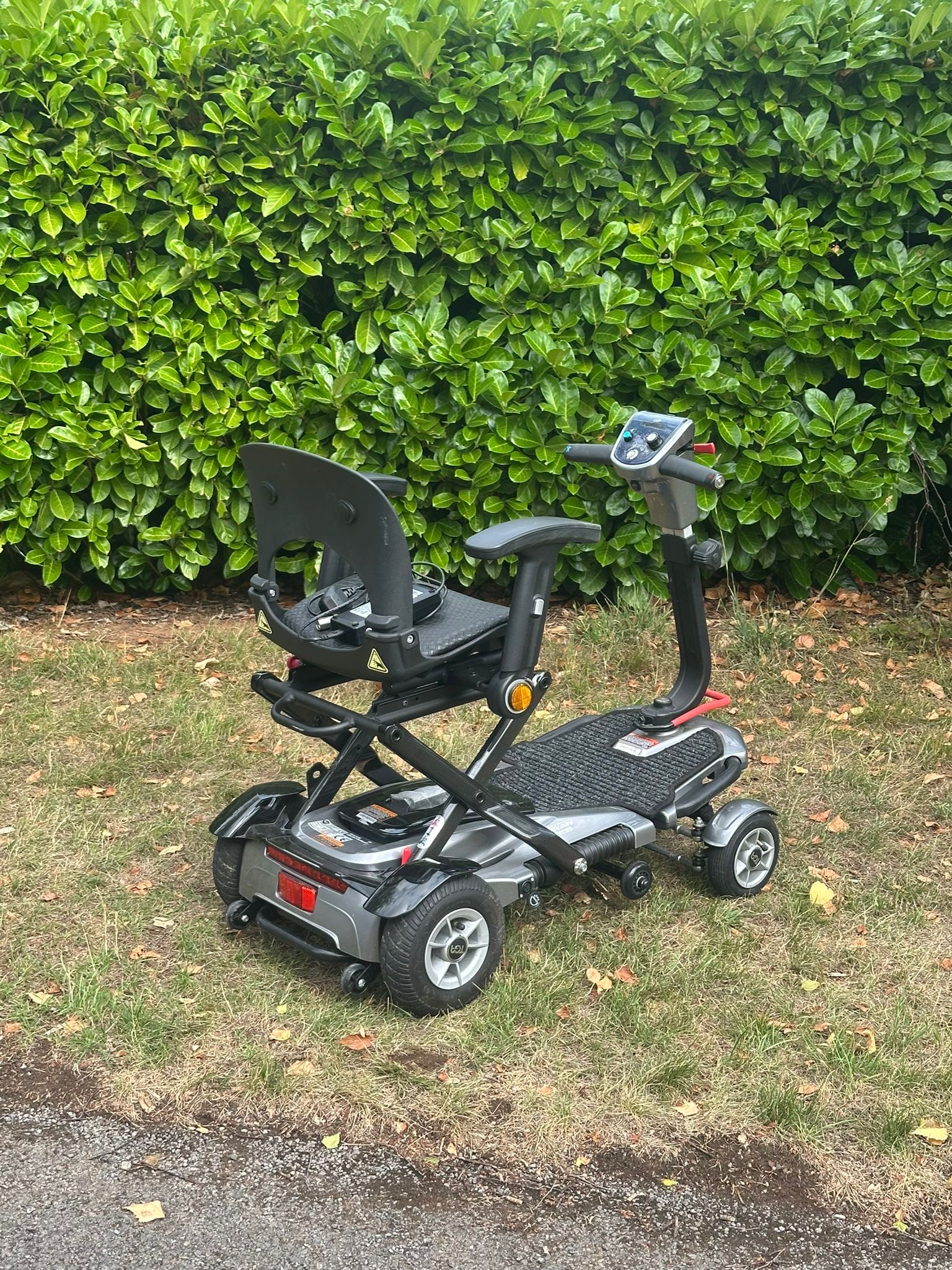 Side view of TGA Minimo refurbished folding mobility scooter UK – compact travel design